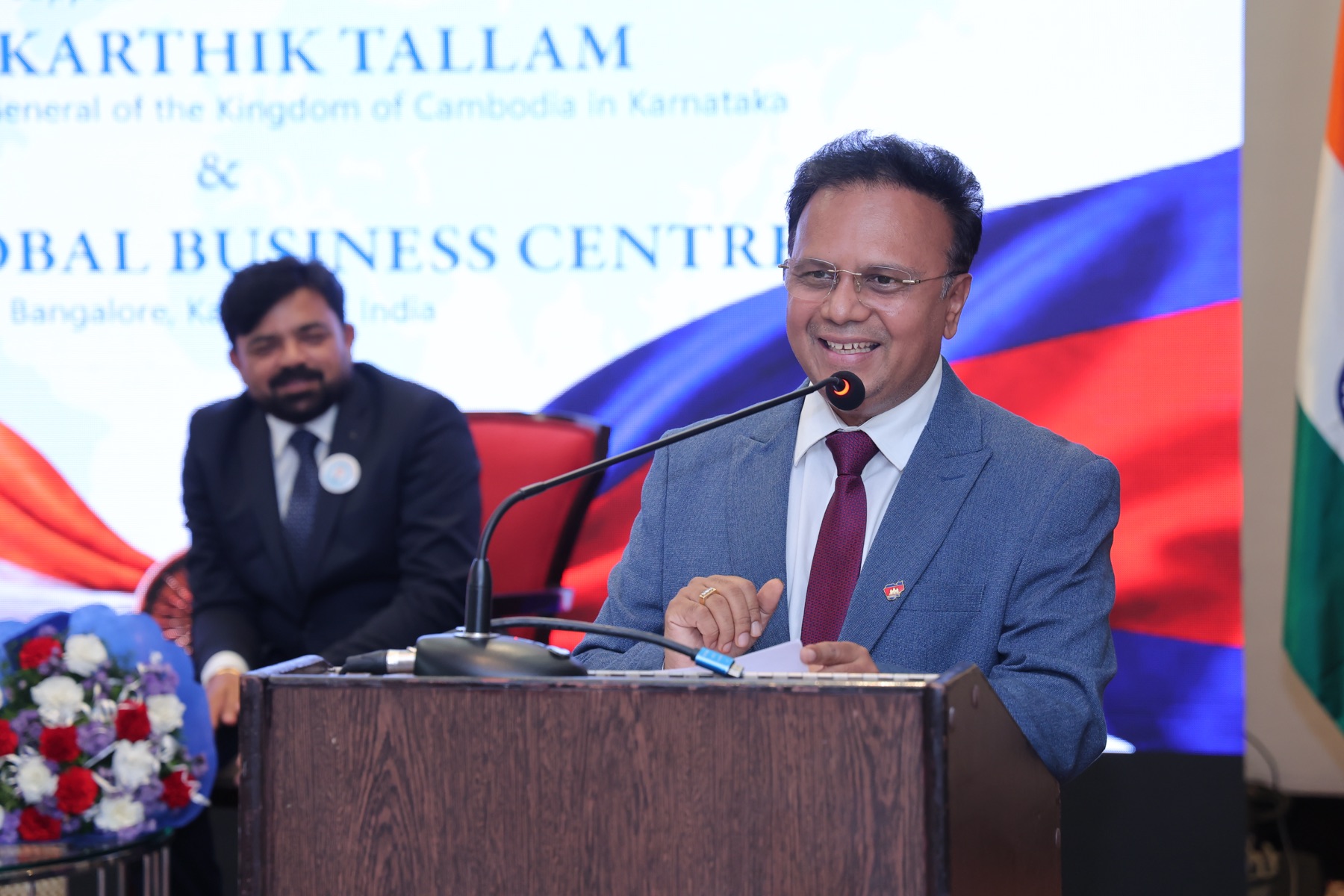 A speaker addressing the India-Cambodia Economic Forum from the podium